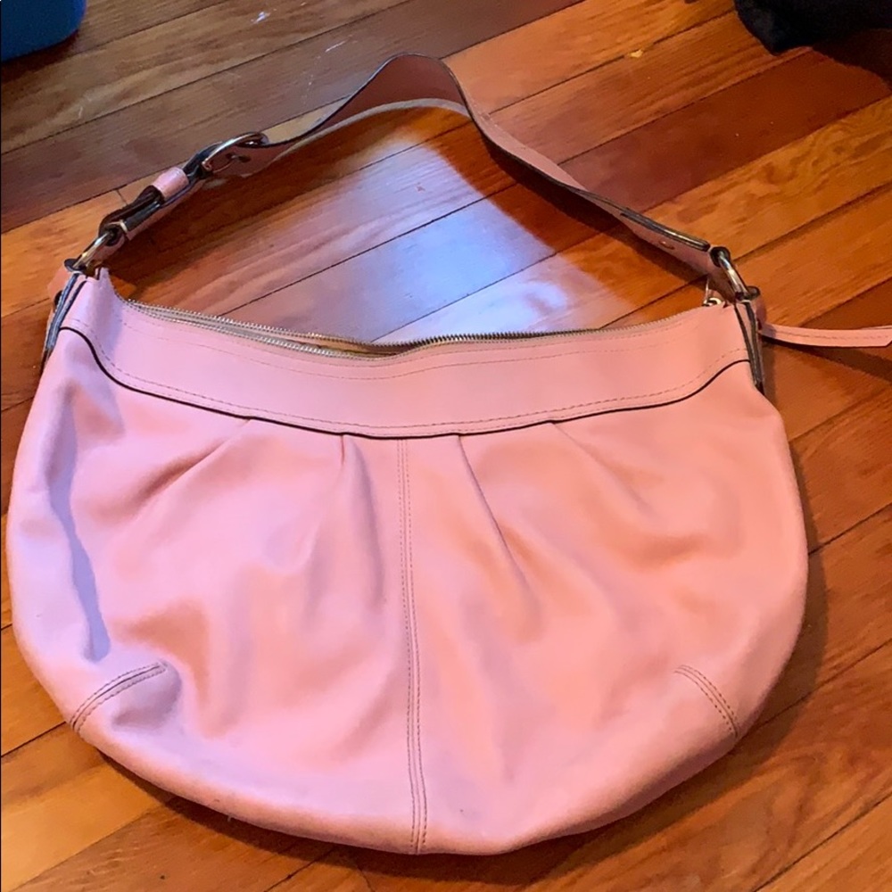 Used pink Coach purse